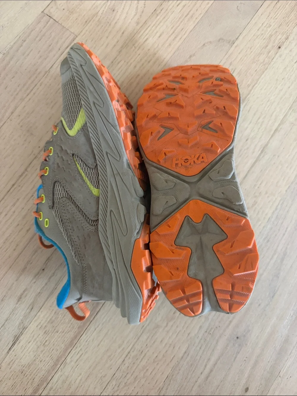 Hoka Kids Tan Sneakers with Bright Blue Lining and Orange Laces